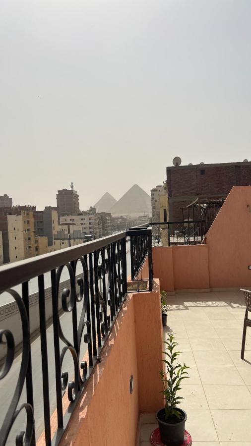 Pyramids Road Guest House Cozy Rooms And Rooftop Breakfast With The Pyramids View Nazlet el-Sisi Экстерьер фото